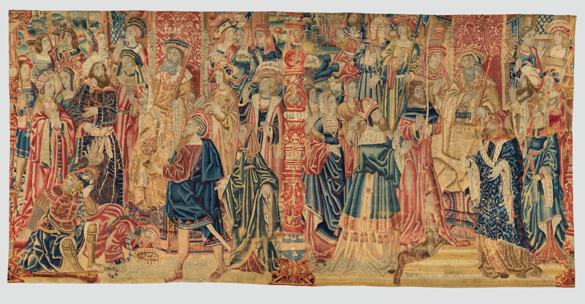 "Mozes and Aaron Before Pharaoh" (ca. 1515-30), a 276.9 x 500.4 wool and silk tapestry of South Netherlandish origin, located in the Metropolitan Museum of Art in New York.