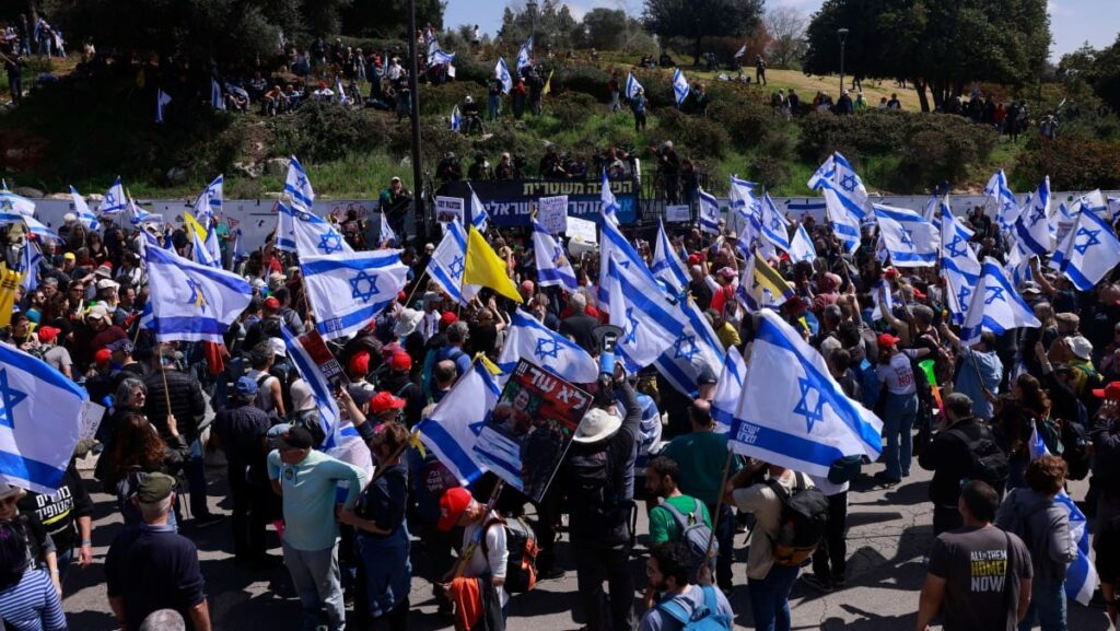 Anti-government demonstrators gather to protest outside the Israeli Prime Minister office in Jerusalem on March 23, 2025, during a government confidence vote meeting against attorney general Gali Baharav-Miara.