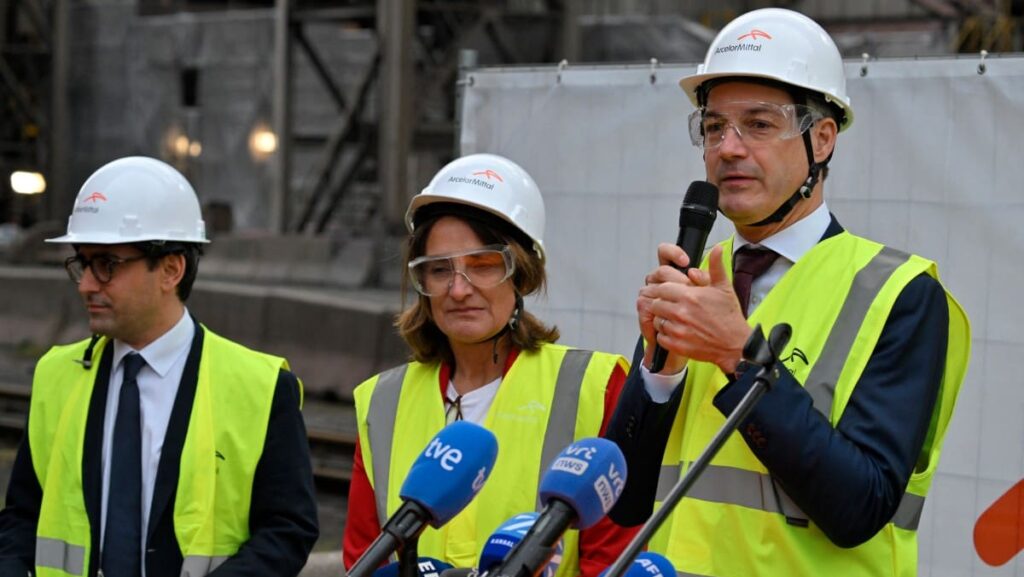 Belgian Prime Minister Alexander de Croo (R) delivers a speech next to Europe's Executive Vice-President for Prosperity and Industrial Strategy Stephane Sejourne (L) and Europe's Executive Vice-President for Clean, Just and Competitive Transition Teresa Ribera (C) during a visit at the ArcelorMittal Belgium plant as preparation for the EU’s Clean Industrial Deal, in Ghent on December 3, 2024.