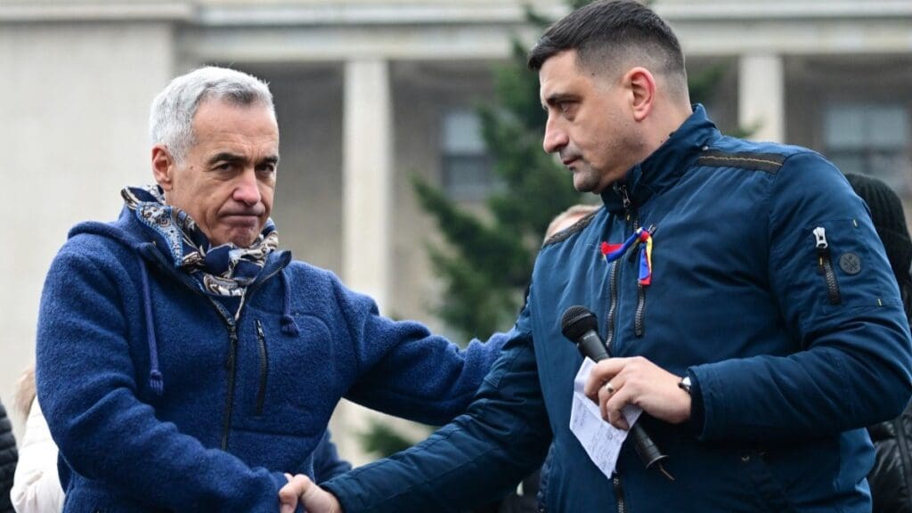 Călin Georgescu (L) with AUR leader George Simion on March 1, 2025.