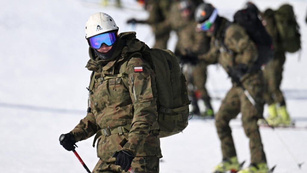 Polish soldiers descend Mount Kasprowy Wierch (1987m) in the Tatra National Park near Zakopane on February 19, 2025.