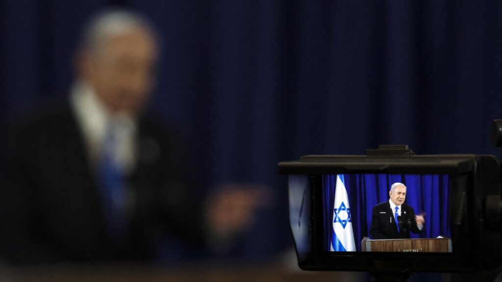 Israeli Prime Minister Benjamin Netanyahu addresses a press conference in Tel Aviv on July 13, 2024 (Photo by Nir Elias / POOL / AFP)