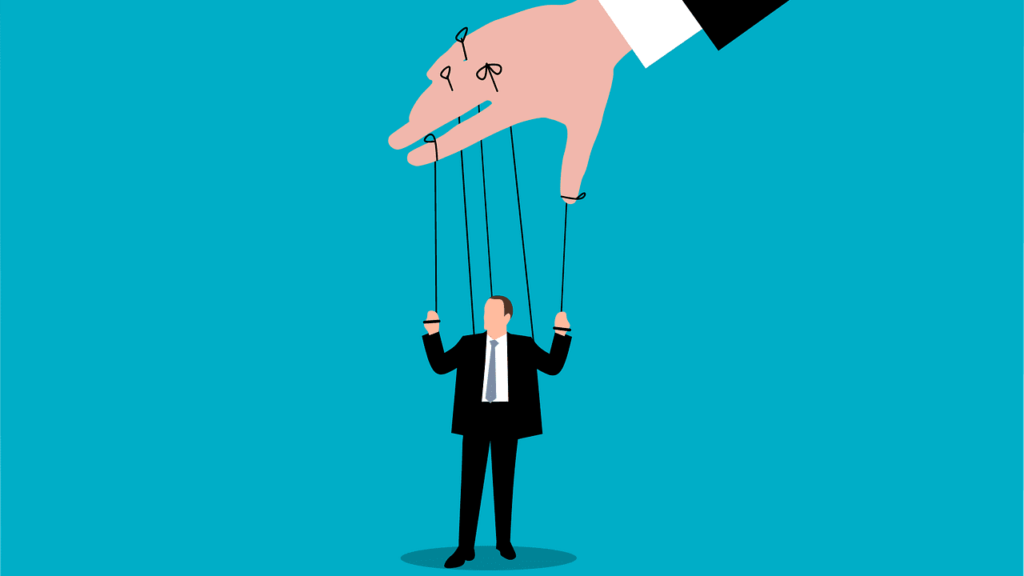 Puppet and puppet master holding strings