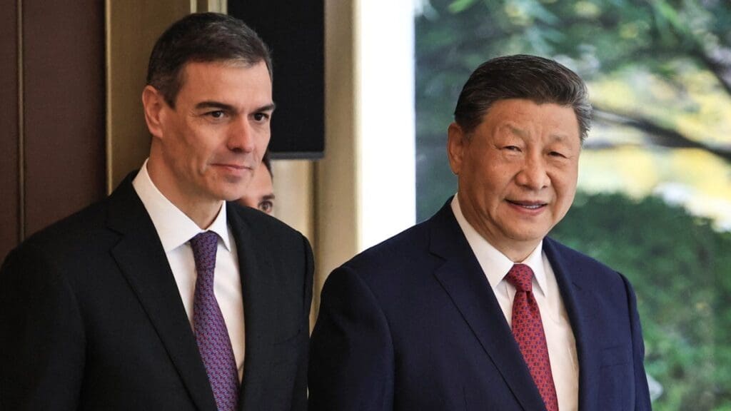 China's President Xi Jinping (R) and Spain's Prime Minister Pedro Sánchez ahead of a bilateral meeting in Beijing on April 11, 2025.