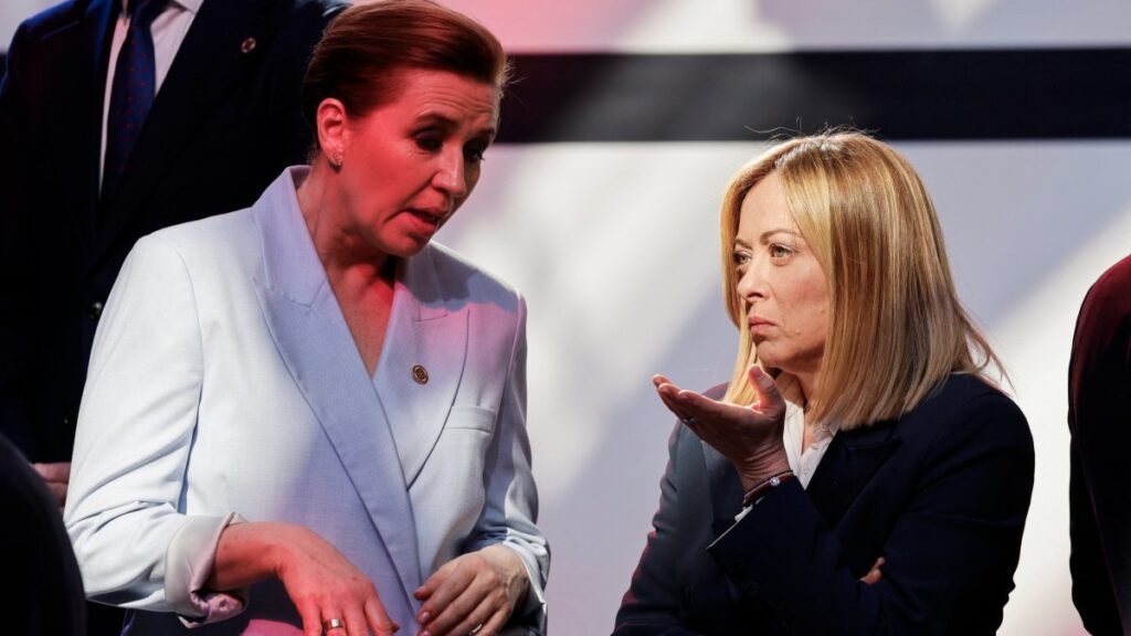 Danish Prime Minister Mette Frederiksen (L) and Italy's Prime Minister Giorgia Meloni before posing for a family picture at an informal Ukraine summit in Paris on March 27, 2025