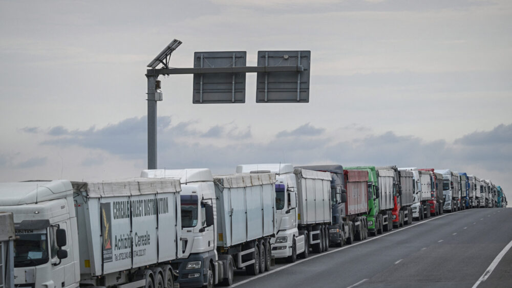 Grain transporting trucks waiting to enter the terminals in Constanta harbor in Romania