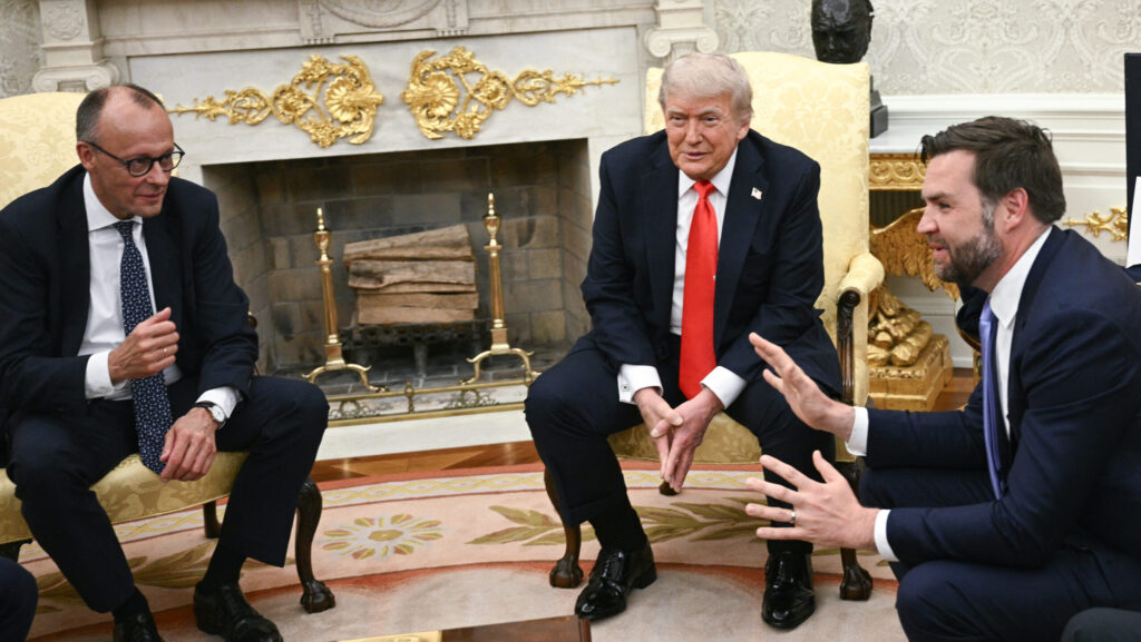 US Vice President JD Vance (R) speaks as President Donald Trump (C) and German Chancellor Friedrich Merz (L) look on during a bilateral meeting in the Oval Office of the White House in Washington, DC, on June 5, 2025.