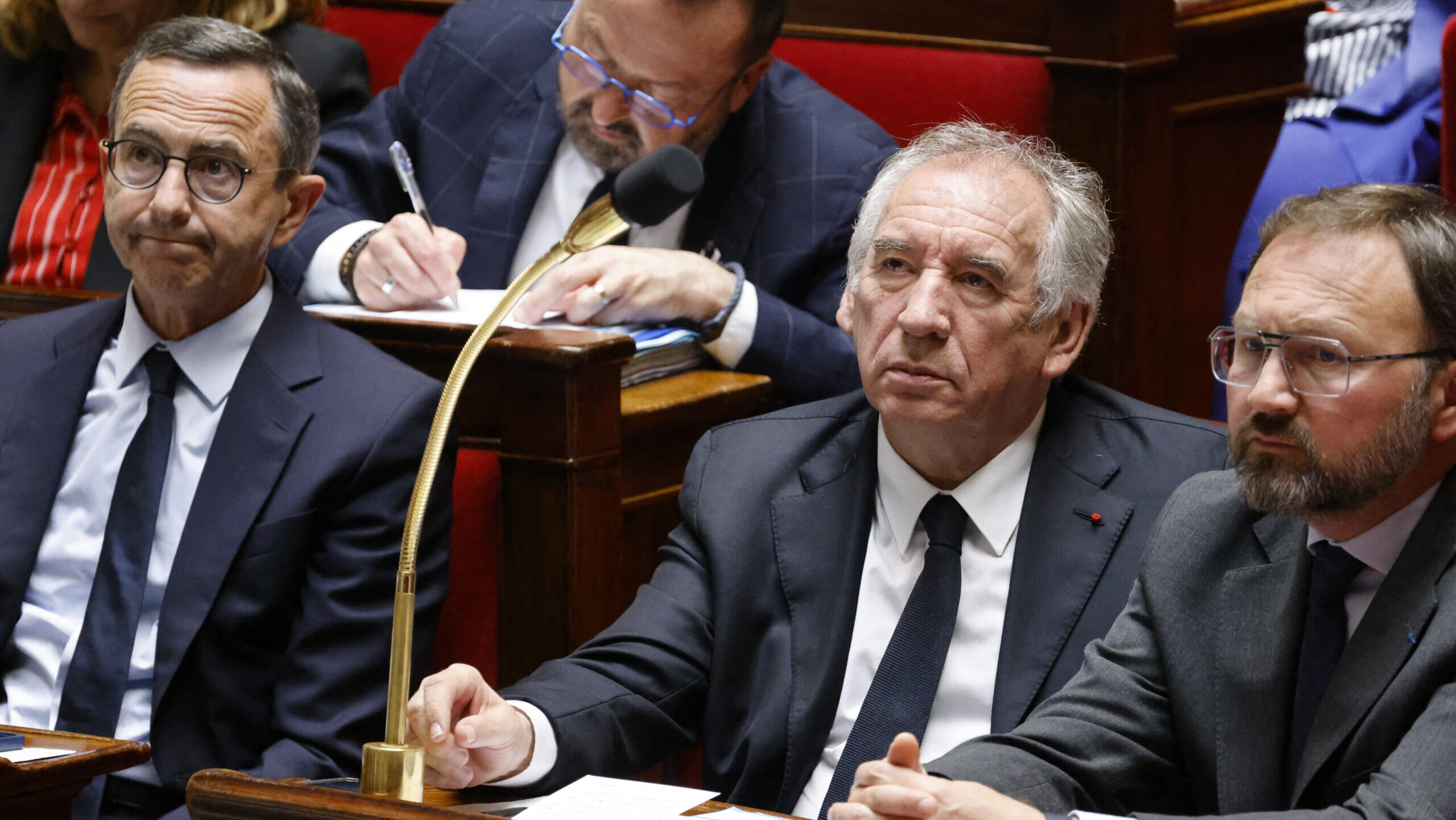 French Minister of the Interior Bruno Retailleau, Prime Minister François Bayrou and Delegate Minister for Relations with Parliament Patrick Mignola listen during a session of questions to the government at the French National Assembly in Paris on April 29, 2025.