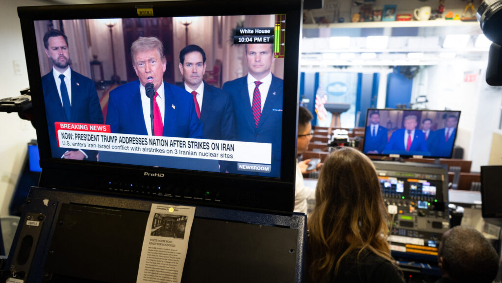 U.S. President Donald Trump addresses the nation regarding the US bombing of Iranian nuclear sites as seen on a television screen in the Brady Press Briefing Room at the White House in Washington, DC, on June 21, 2025.