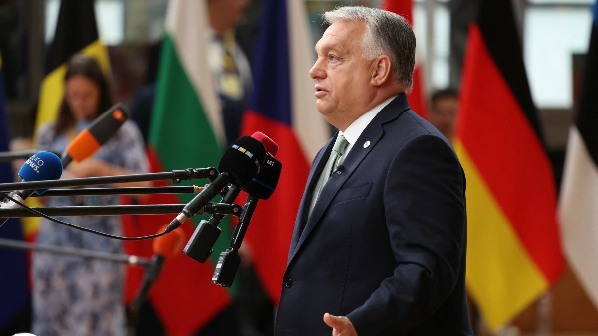 Hungary's Prime Minister Viktor Orbán speaks to the press as he arrives to attend the European Council in Brussels on June 26, 2025.