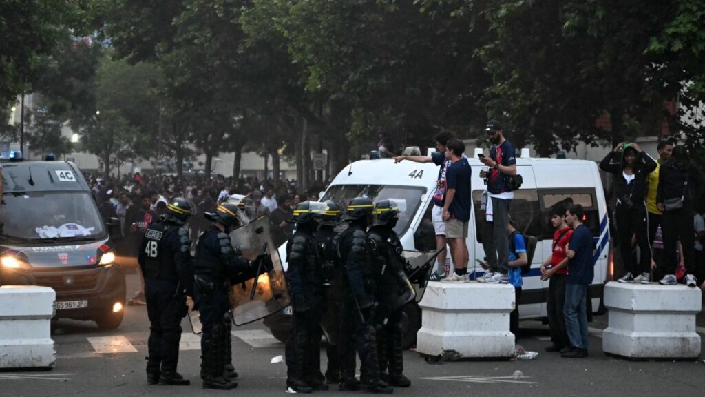 French CRS riot police form up to contain Paris Saint-Germain (PSG) supporters during the UEFA Champions League final between PSG (PSG) and Inter Milan near the Parc des Princes Stadium in Paris on May 31, 2025.