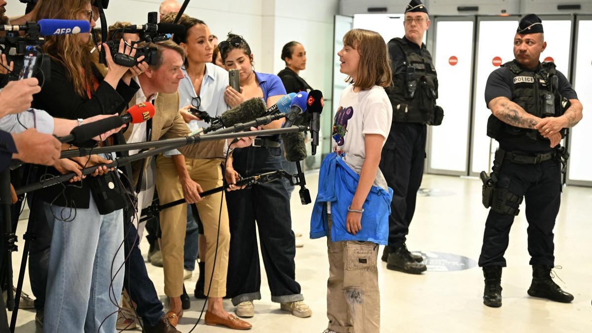 Greta Thunberg engages with the press upon her arrival at the Roissy-Charles de Gaulle Airport en route to Sweden, after being deported by the Israeli authorities on June 10, 2025.
