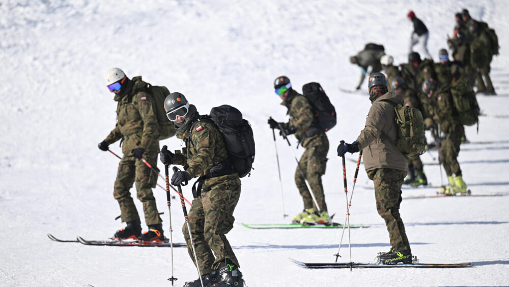 Polish soldiers descend Mount Kasprowy Wierch