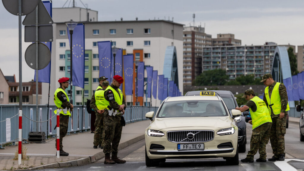 Polish border guards check cars at the Polish-German border in Slubice, western Poland