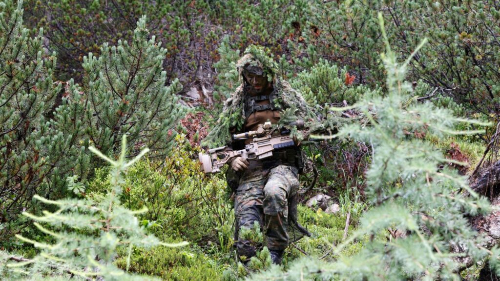 A sniper seen during a visit of the German chancellor to the German Federal Armed Forces (Bundeswehr) mountain infantry brigade in Schneizlreuth, southern Germany, on July 22, 2024.