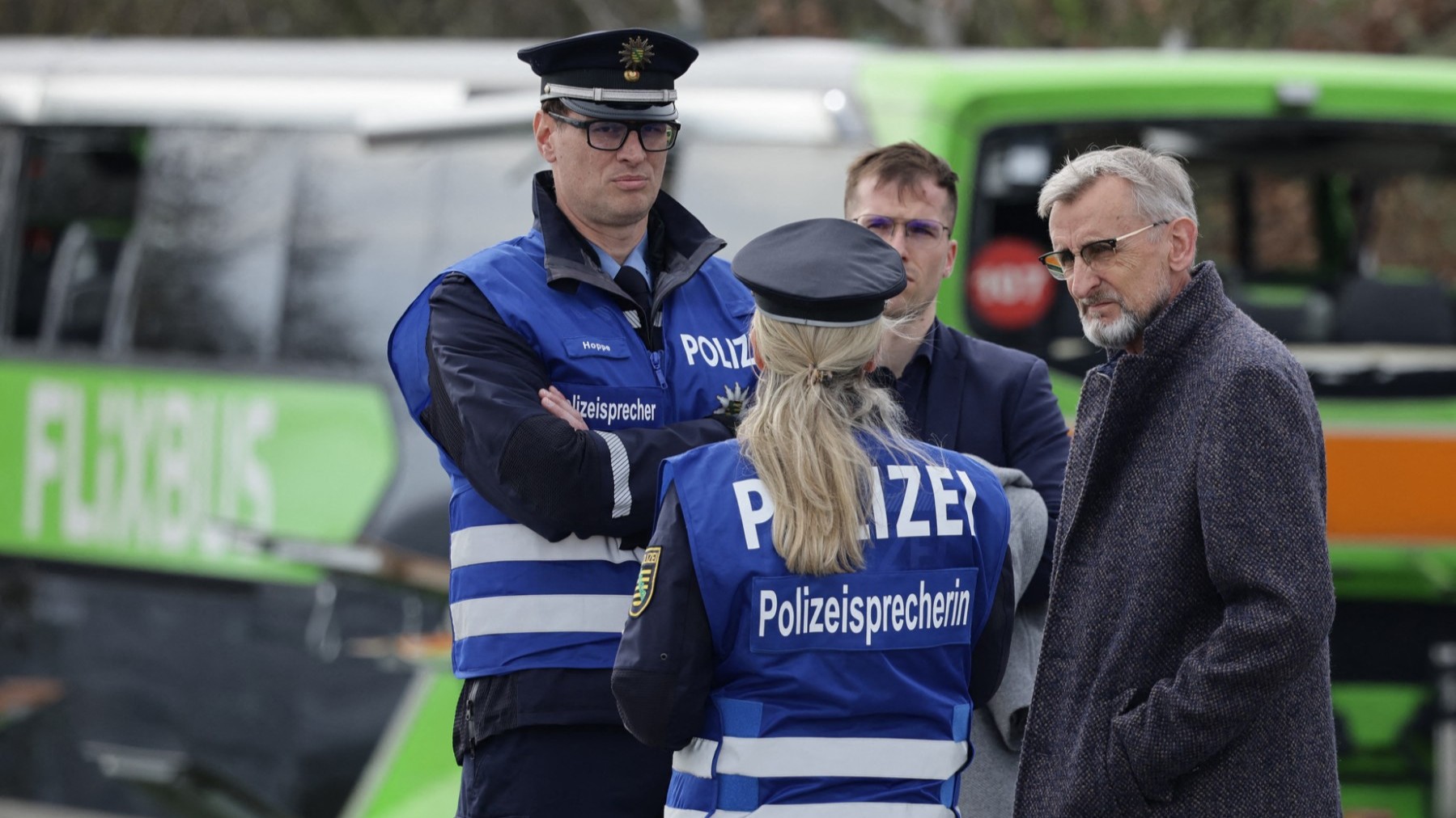Saxony Interior Minister Armin Schuster talks to police officers on March 27, 2024.