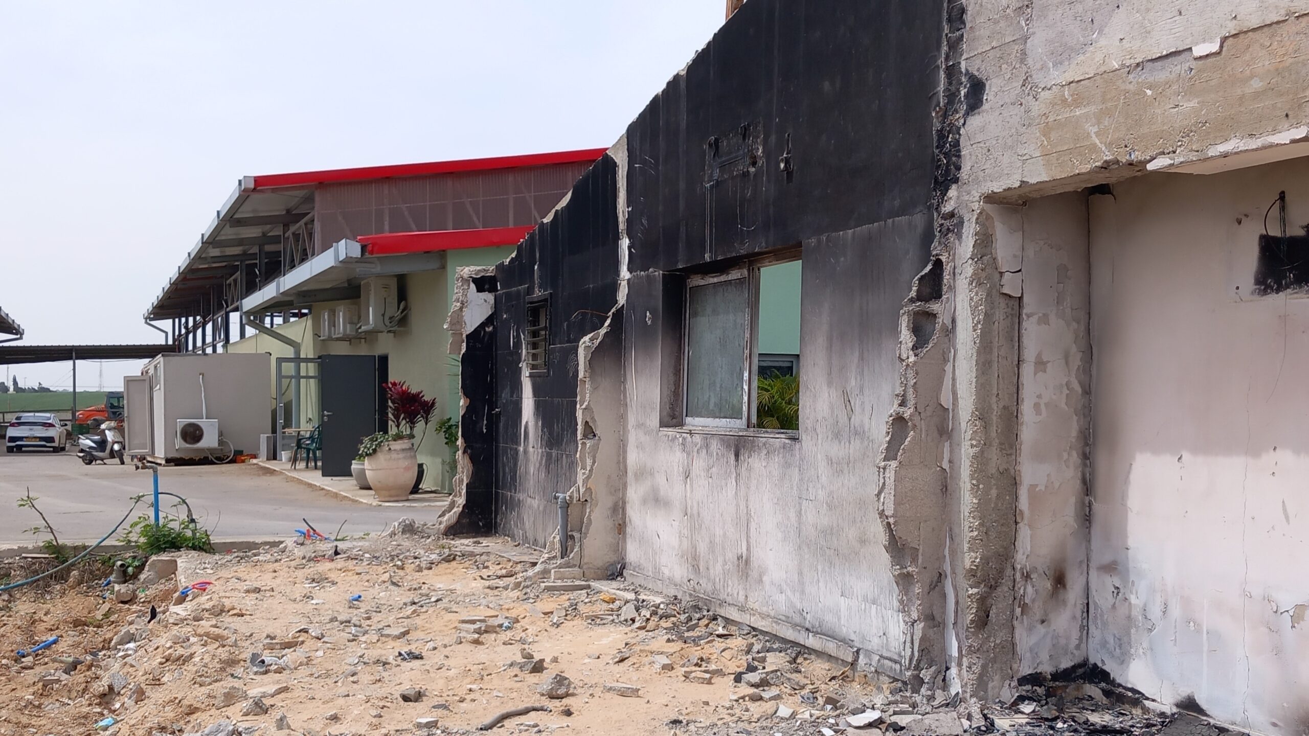 The burned residential quarters of the Thai workers at Kibbutz Alumim on October 7, 2025