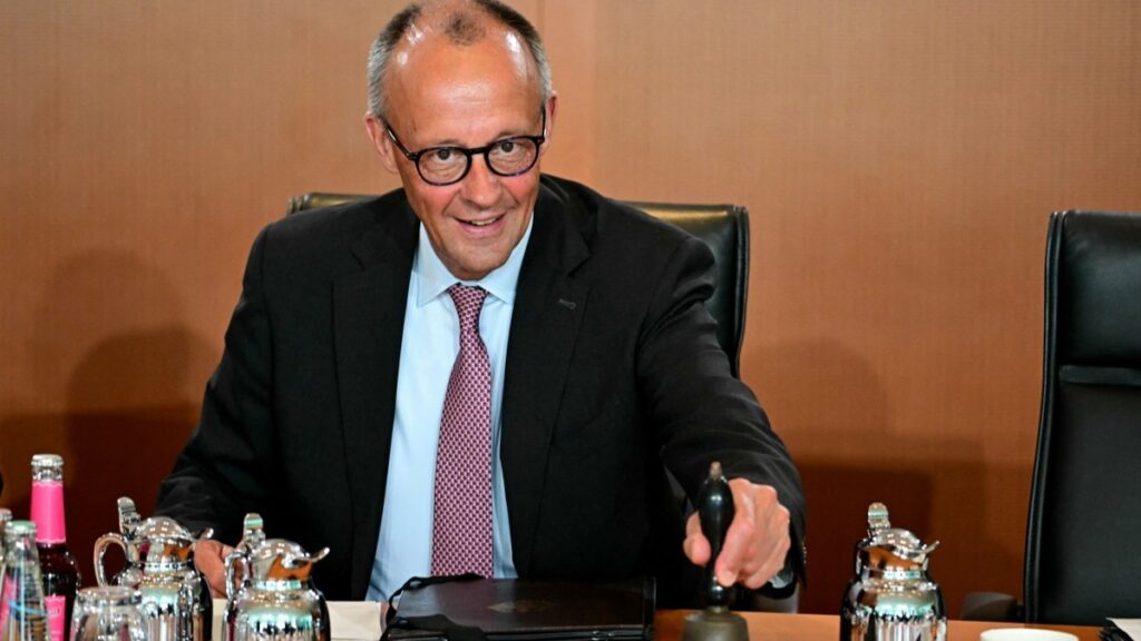 German Chancellor Friedrich Merz signals the start of the weekly meeting of the German cabinet at the Chancellery in Berlin on July 2, 2025.
