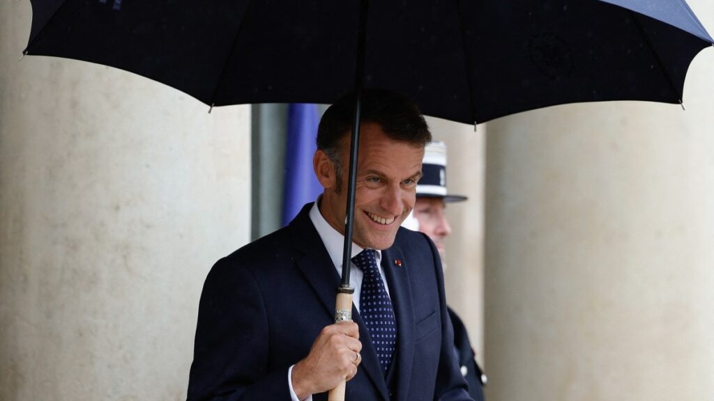 France’s President Emmanuel Macron waits for Lebanon’s prime minister ahead of their working lunch at the presidential palace in Paris on July 24, 2025.
