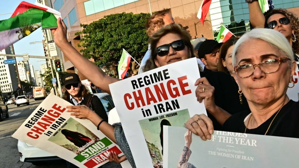 Iranian American demonstrators gather to call for regime change in Iran, as U.S. President Donald Trump announced a ceasefire between Israel and Iran, outside the Wislhire Federal Building in Los Angeles on June 23, 2025.