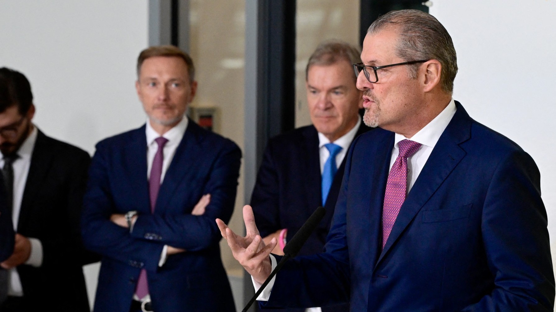 (Former) German Finance Minister Christian Lindner (3rd R), also leader of Germany’s free democratic FDP party, listens as Rainer Dulger (R), President of the Confederation of German Employers' Associations (BDA), gives a statement on October 29, 2024 in Berlin.