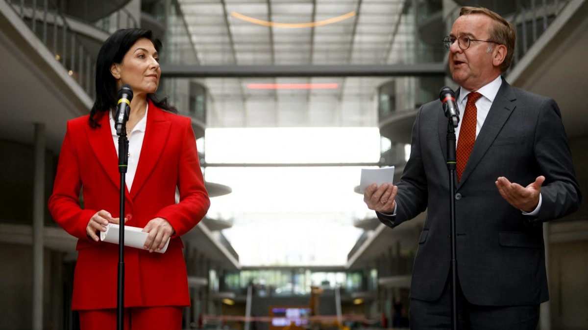 German Economy and Energy Minister Katherina Reiche and German Defence Minister Boris Pistorius address a press conference in Berlin on a new bill that seeks to speed up procurement for the German armed forces, on July 23, 2025.