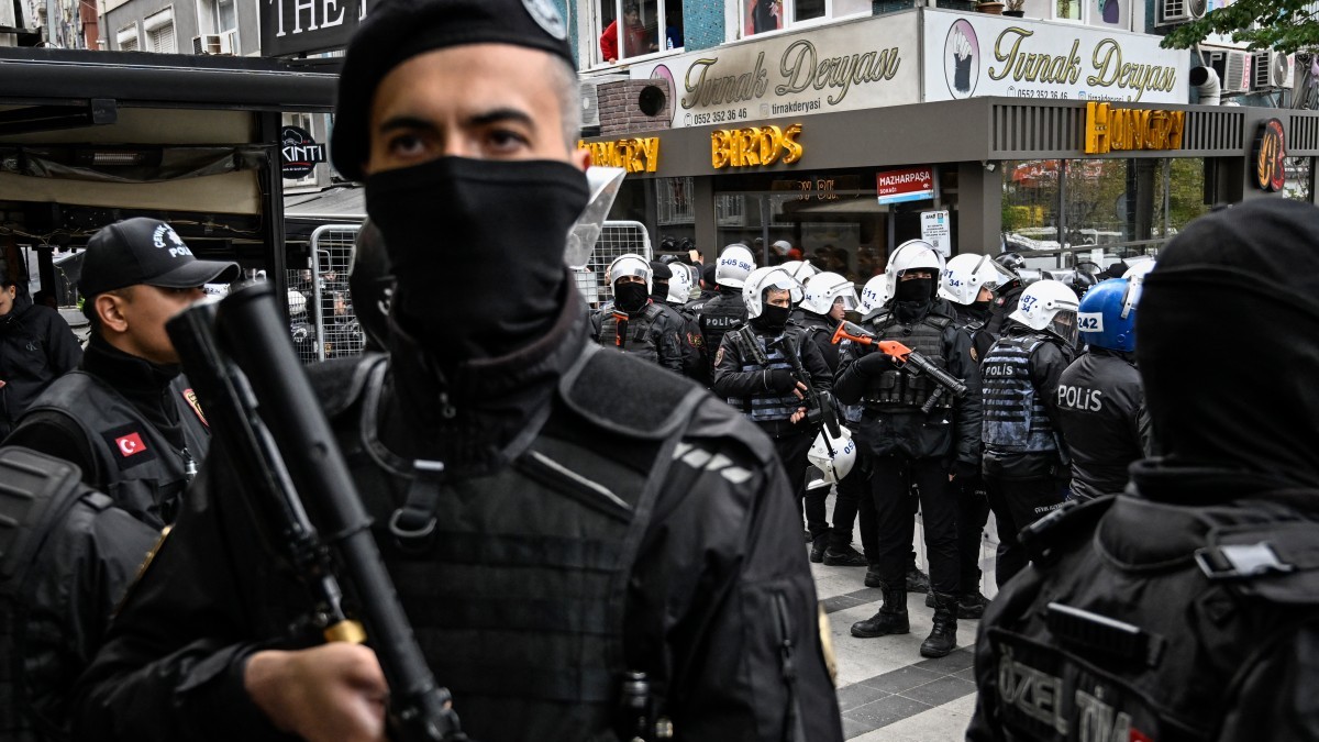 Turkish police stand guard as they stop protesters attempting to march to Taksim Square during a May Day rally in Istanbul on May 1, 2025.