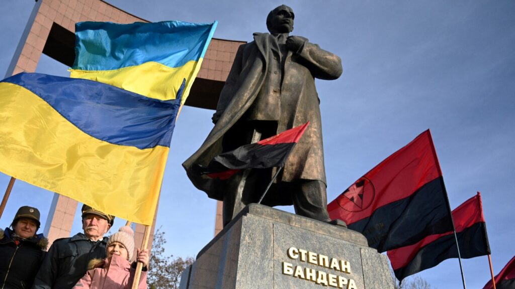 People attend a ceremony marking the 116th anniversary of the birth of Ukrainian far-right leader and Stepan Bandera in the western Ukrainian city of Lviv on January 1, 2025.