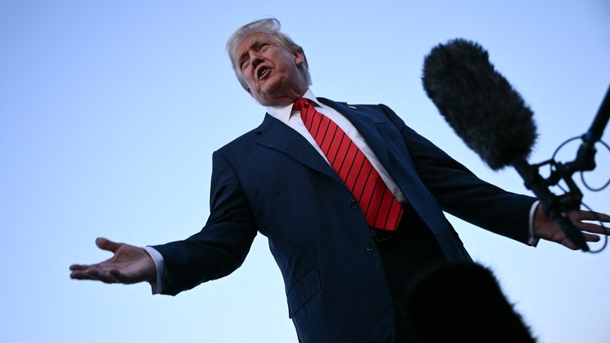 U.S. President Donald Trump speaks to journalists at Lehigh Valley International Airport in Allentown, Pennsylvania, on August 3, 2025.