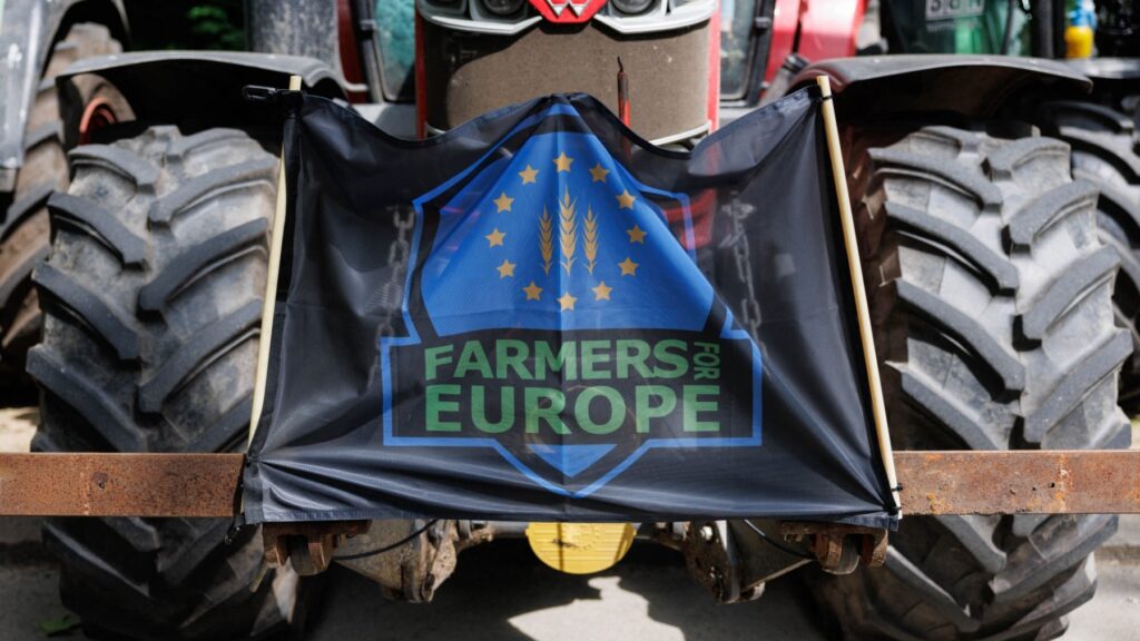 A sign reading “Farmers for Europe” is seen on a tractor during a demonstration in Brussels called by the Farmers Defence Force to protest against European regulations on June 4, 2024.