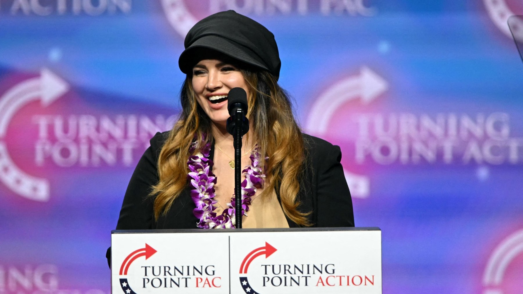 U.S. actress and former mixed martial artist Gina Carano speaks during a Turning Point Action 'United for Change' campaign rally on October 24, 2024.