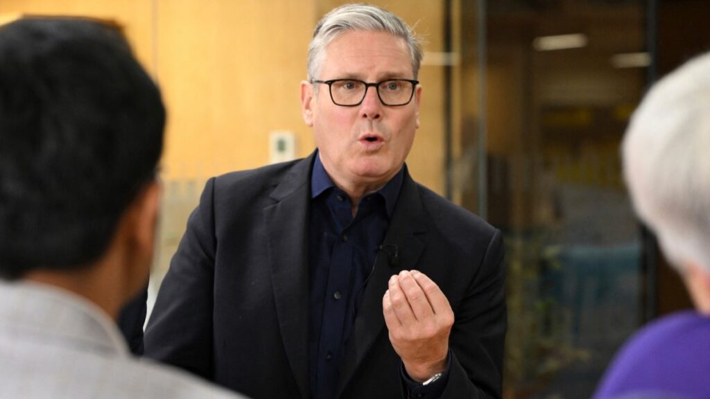 UK Prime Minister Keir Starmer speaks to members of small businesses during his visit to the Workshed co-working centre in Swindon, England on July 31, 2025.