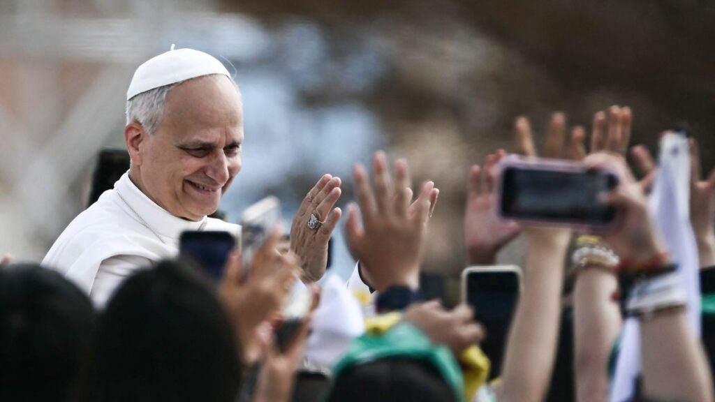 Pope Leo XIV waves as he leaves after leading a mass in the Tor Vergata district of Rome, as part of Jubilee of Youth, on August 3, 2025.