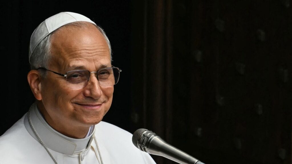 Pope Leo XIV leads the Angelus prayer from the entrance of the Apostolic Palace at the summer papal estate in Castel Gandolfo, southeast of Rome on August 15, 2025.