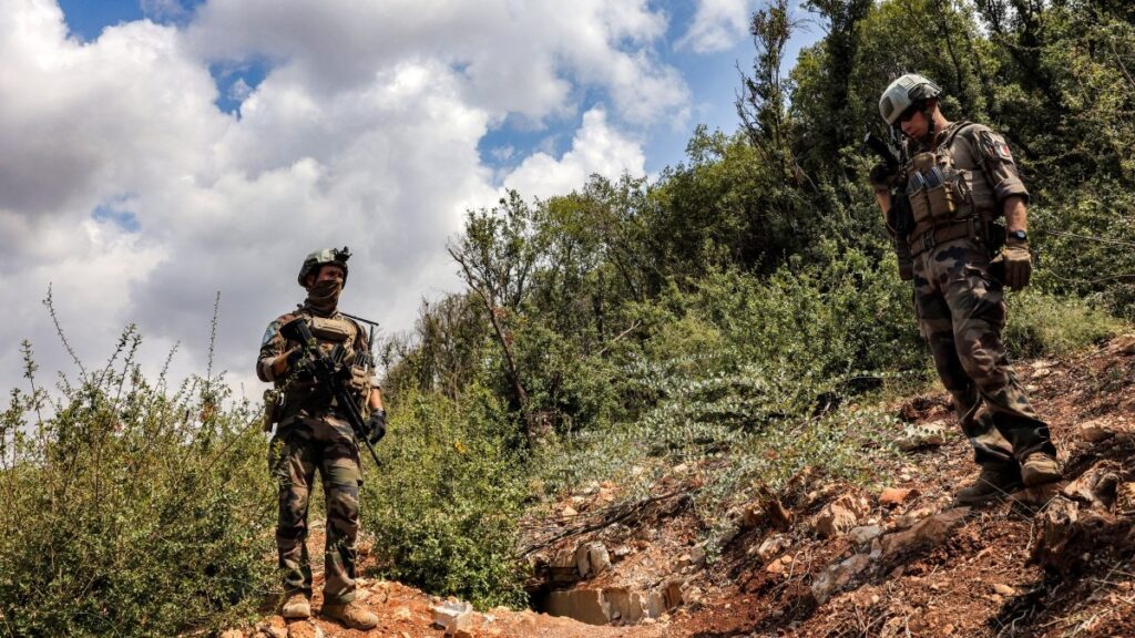 Peacekeepers of the United Nations Interim Force in Lebanon (UNIFIL) stand at a position formerly held Iran-backed Hezbollah in the Khraibeh Valley in el-Meri in south Lebanon on August 27, 2025.