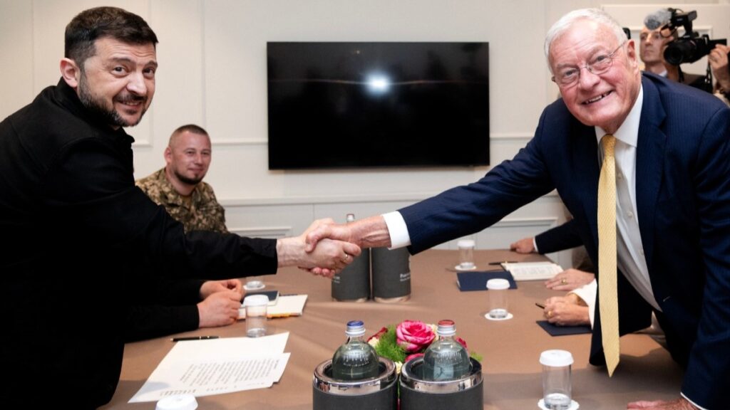 U.S. Special Envoy for Ukraine Keith Kellogg (R) and Ukrainian President Volodymyr Zelenskyy (L) shake hands ahead of a meeting in Rome on July 9, 2025, on the eve of the Ukraine Recovery Conference.