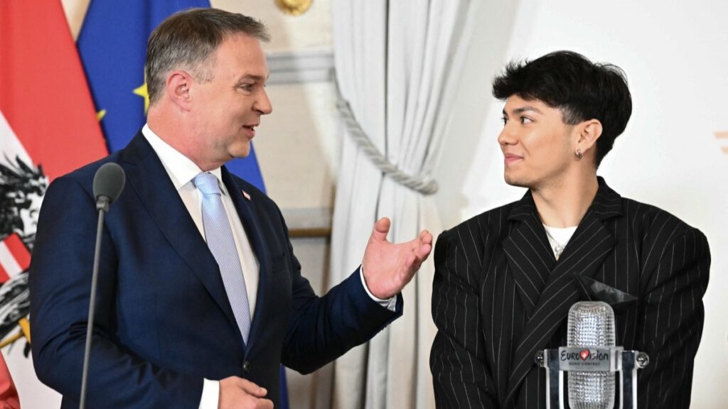 Austrian Vice-Chancellor and Culture Minister Andreas Babler (L) addresses a press conference with Austrian singer Johannes Pietsch aka JJ, winner of the 2025 Eurovision Song Contest, at the Chancellery in Vienna, Austria on May 19, 2025.