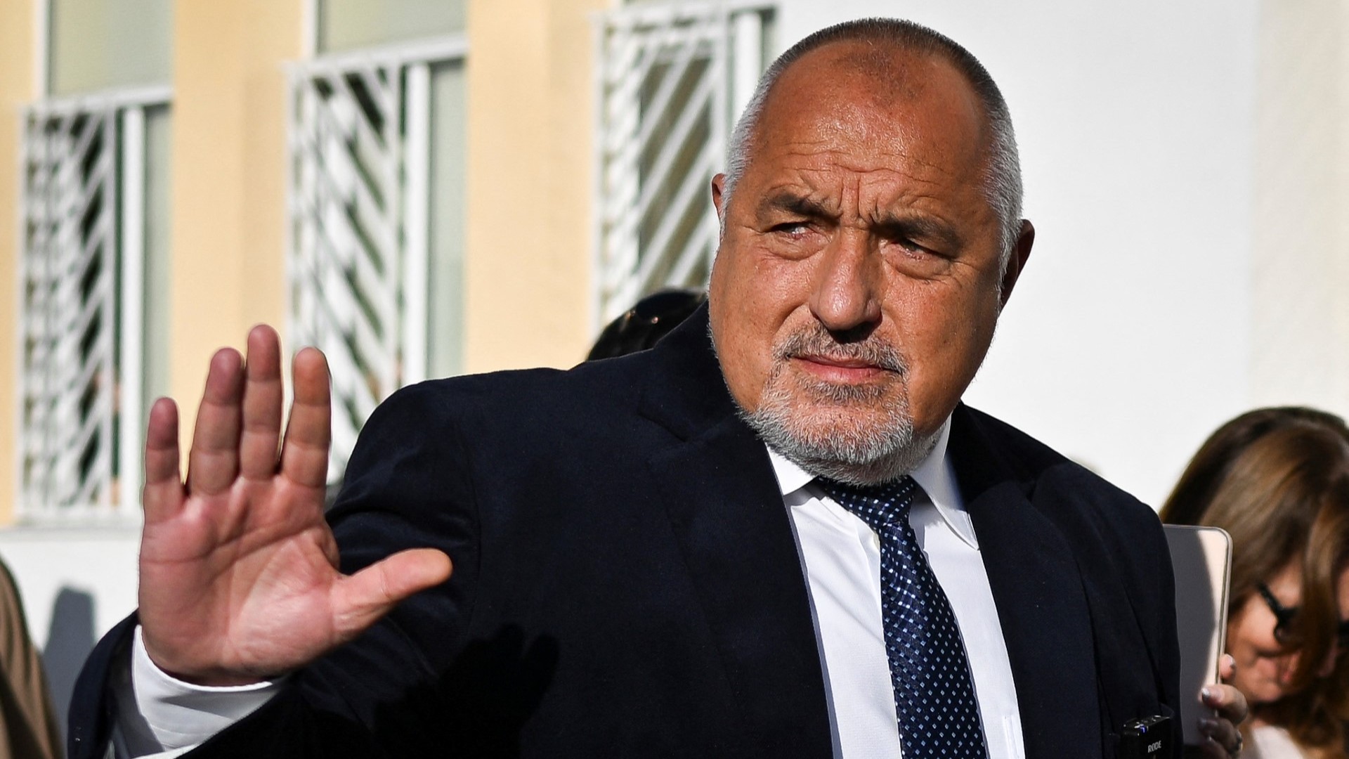 GERB party leader and (then) former prime minister Boyko Borisov greets supporters after voting in Bulgaria's parliamentary elections at a polling station in Sofia on October 27, 2024.