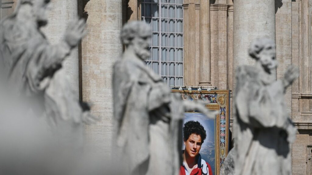 A portrait of late Italian teenager Carlo Acutis displayed on the facade of Saint Peter's Basilica during a Holy Mass and canonisation of Blessed Carlo Acutis and Pier Giorgio Frassati in St Peter's Square at the Vatican on September 7, 2025.