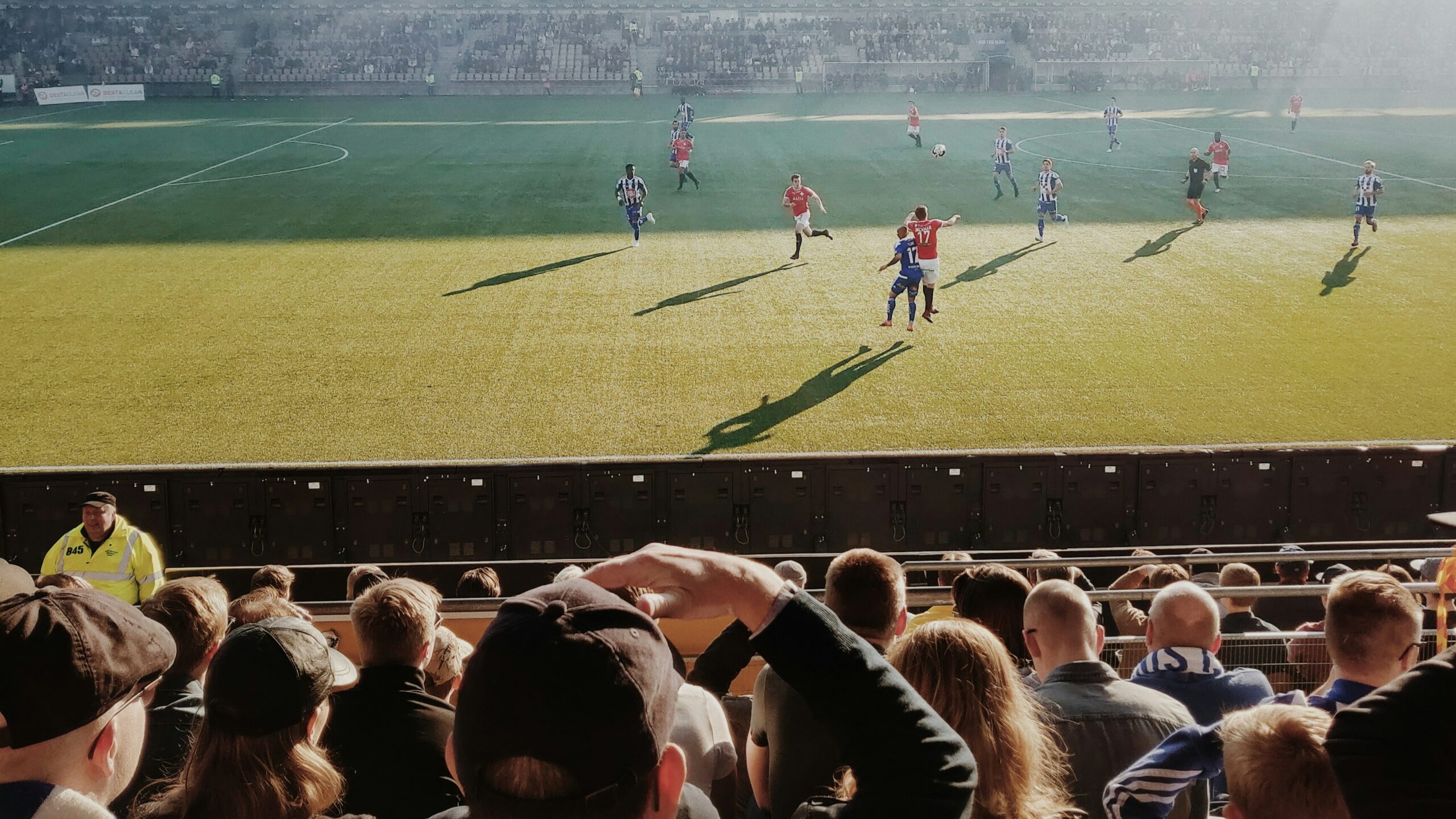 Fans watch football match in Finland (illustration, Unsplash)