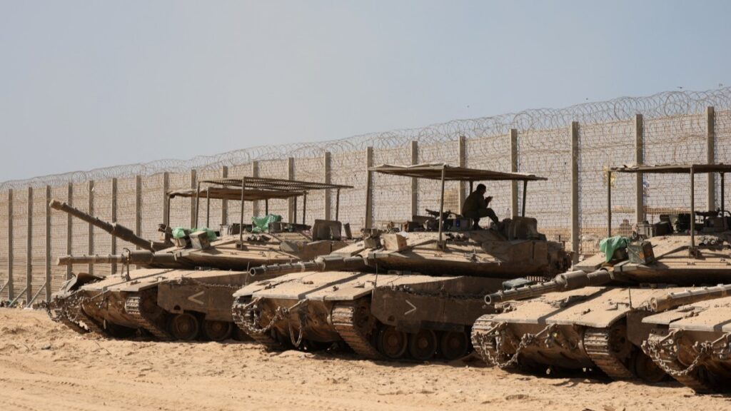 Israeli troops deployed near the border fence with Gaza on September 17, 2025