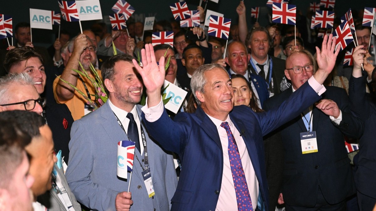 Reform UK Leader Nigel Farage with supporters on the second and final day of the Reform UK party conference at the NEC Birmingham, central England, on September 6, 2025.