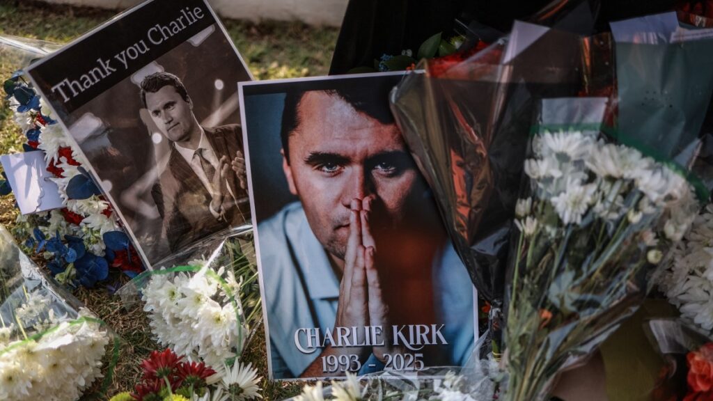 Flowers, wreaths and photos laid in tribute to Charlie Kirk outside the U.S. Embassy in Pretoria, South Africa on September 11, 2025