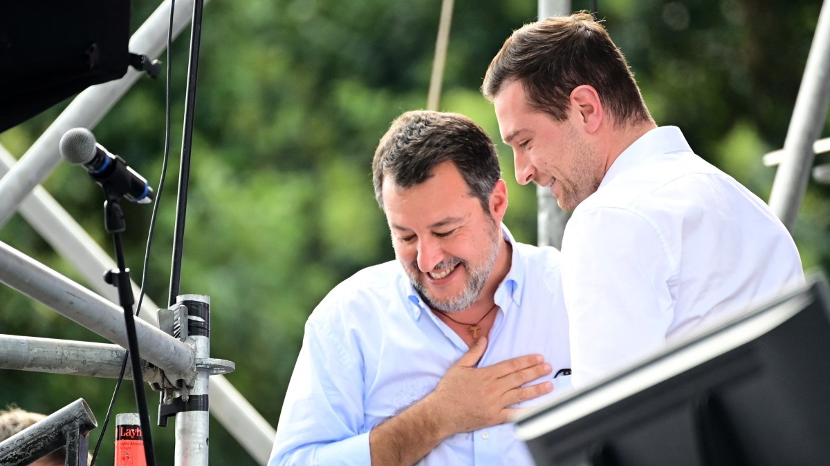 Lega leader Matteo Salvini (L) greets the president of Rassemblement National (RN) Jordan Bardella backstage during the annual Pontida rally on September 21, 2025.