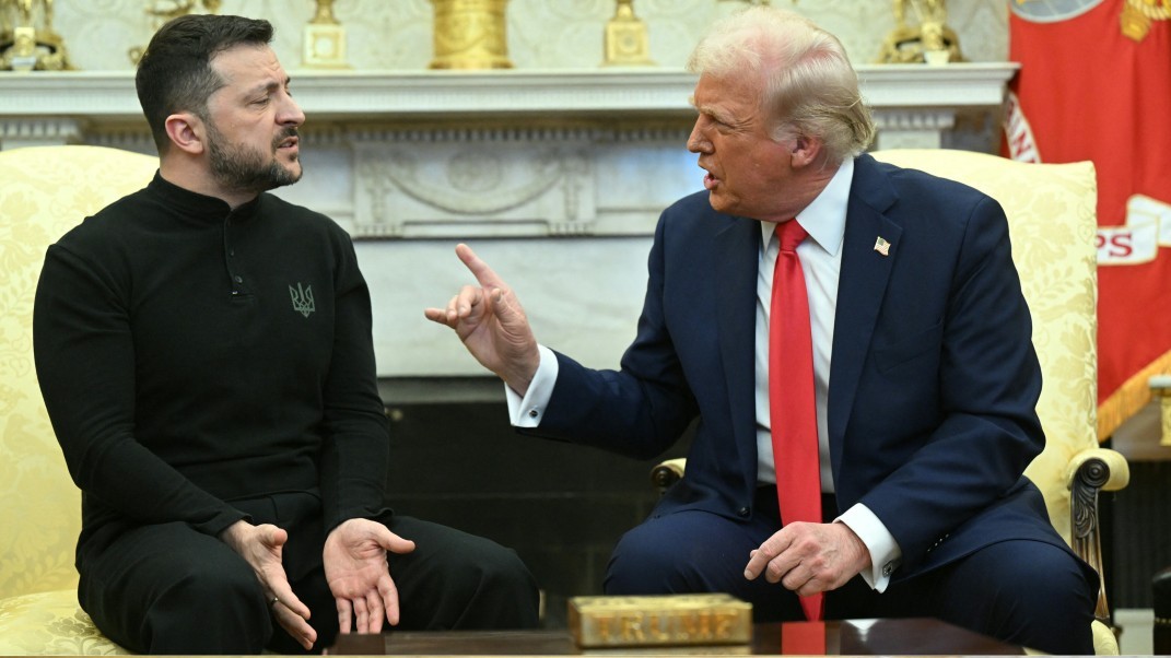 Donald Trump and Volodymyr Zelensky interact in the Oval Office in 2025