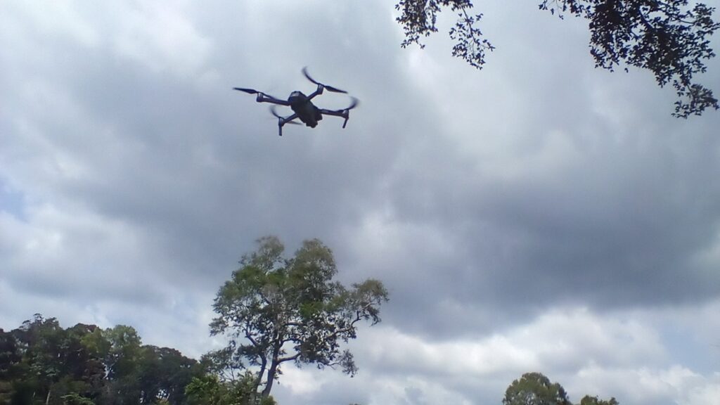 A drone flying over Kakum National Park