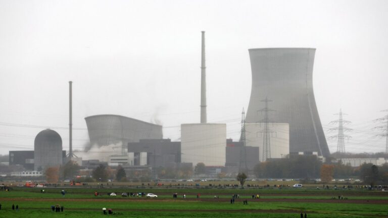 one of two nuclear power cooling towers falling down
