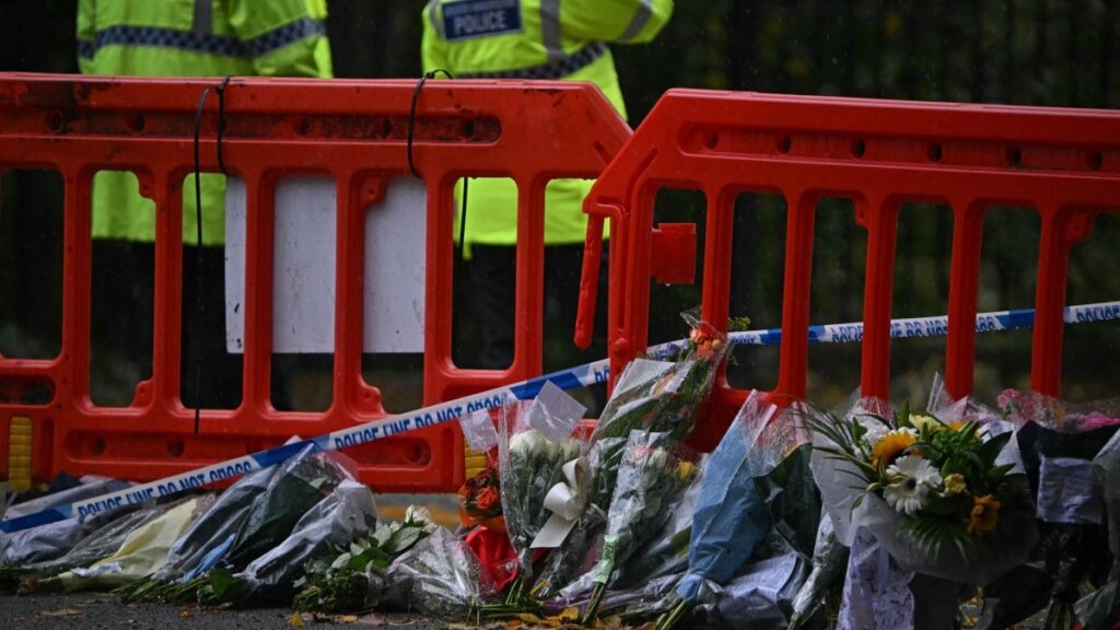 Flowers left at the police cordon outside Heaton Park Hebrew Congregation synagogue in Crumpsall, north Manchester, on October 4, 2025, following an attack at the synagogue on October 2