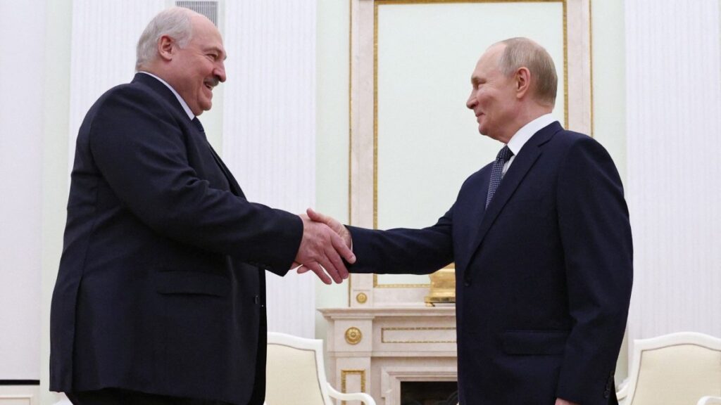 Russia’s president Vladimir Putin (R) shakes hands with Belarus’ President Alexander Lukashenko during a meeting in the Kremlin in Moscow, on September 26, 2025.