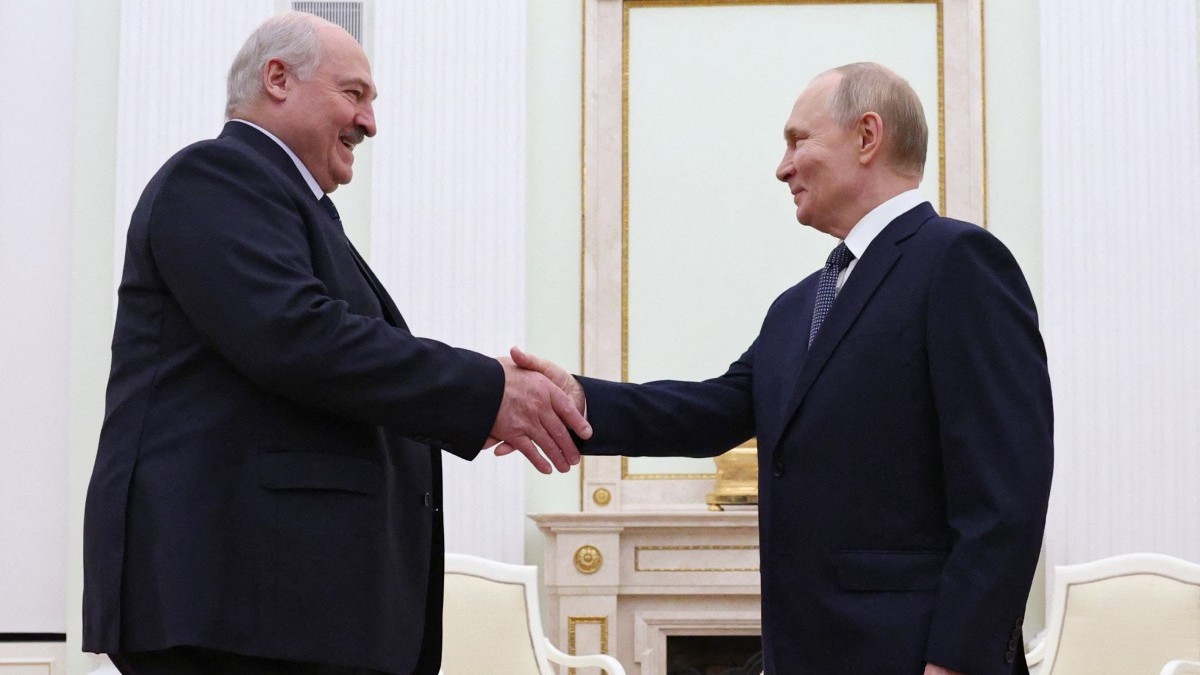 Russia’s president Vladimir Putin (R) shakes hands with Belarus’ President Alexander Lukashenko during a meeting in the Kremlin in Moscow, on September 26, 2025.